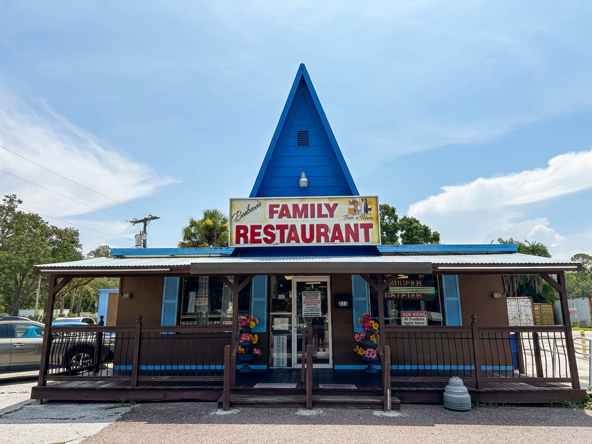Barbara's Family Restaurant storefront — the blue A-frame roof and cream sign on US-41